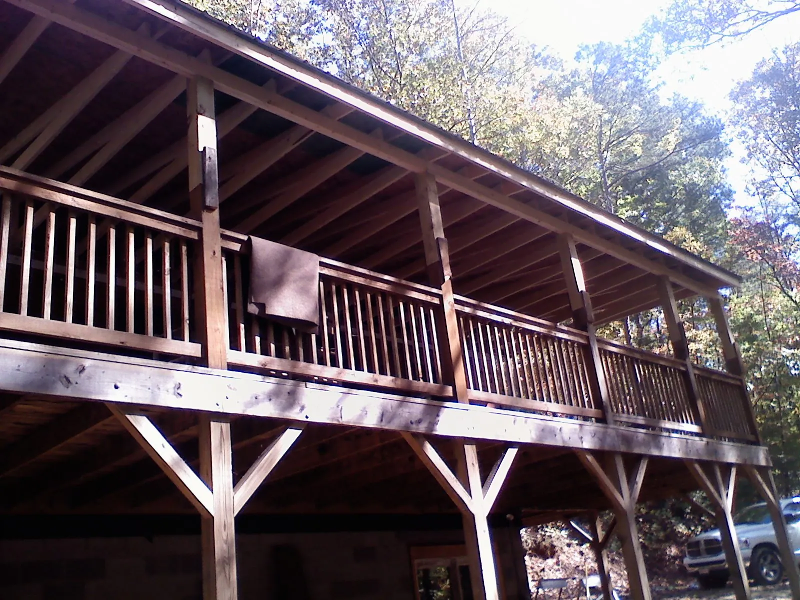 Timber framing under a new elevated porch and deck — Roof Leak Repair in Jackson Heights by Roofing Brothers